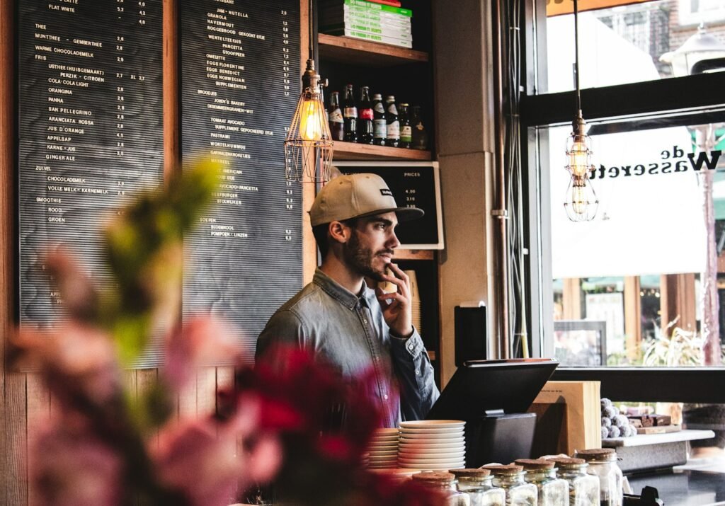 Best Voice AI Tools for Restaurants & Virtual Reception (2026) Restaurant counter service scene, representing voice AI tools that answer reservation and ordering calls for local businesses