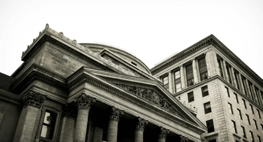 Classical bank building with stone columns, representing US financial services firms