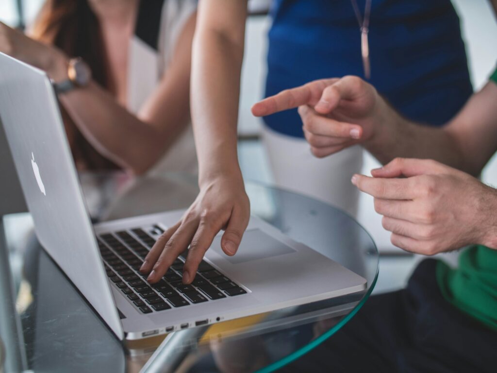 Best AI Tools for Content Optimization 2026 Ranked Editor reviewing a draft on a laptop, illustrating the best AI tools for content optimization 2026