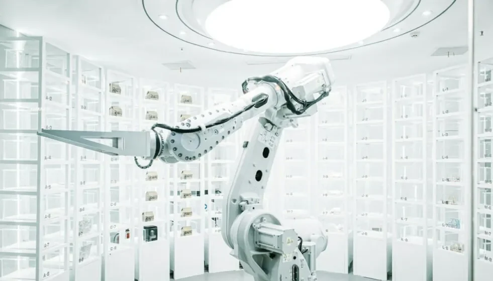 Robotic arm in a white automated lab, illustrating the automation behind AI customer service tools