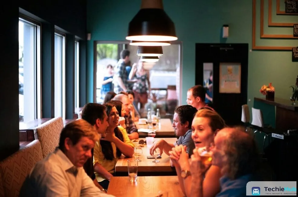 Busy dining room at peak service, when the best voice AI tools for restaurant efficiency answer reservation calls staff cannot reach