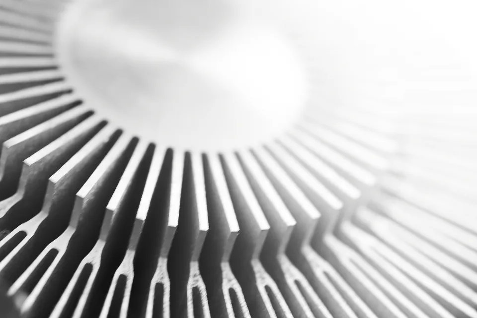 Aluminium heatsink fins close-up, a reminder that long video renders keep a GPU under full load