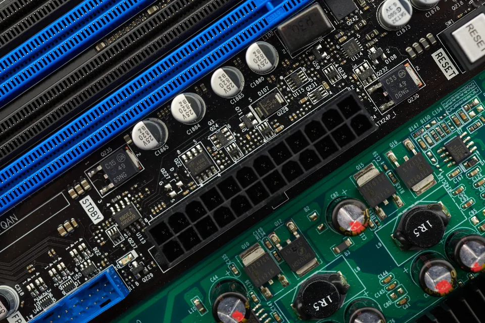 Local AI: The Complete Guide to Running AI Models on Your Own Hardware (2026) Close-up of a computer motherboard with memory slots and capacitors, the hardware that runs local AI models