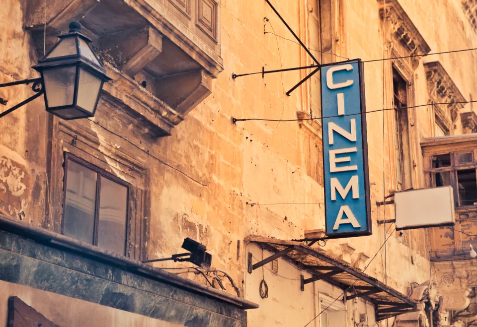 Best Local AI Video Editors: Edit With AI on Your Own Computer Old cinema sign on a stone building, a nod to editing film with a local AI video editor